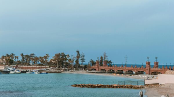 Orange Concrete Bridge Surrounded by Water